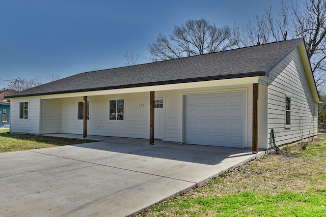 single story home with a garage, driveway, and a shingled roof