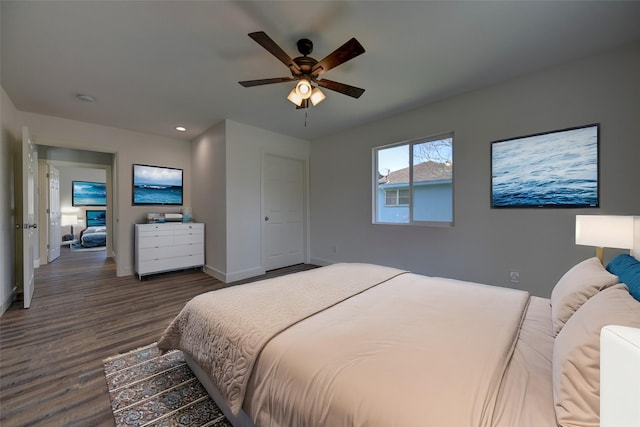 bedroom with recessed lighting, dark wood-style flooring, ceiling fan, and baseboards