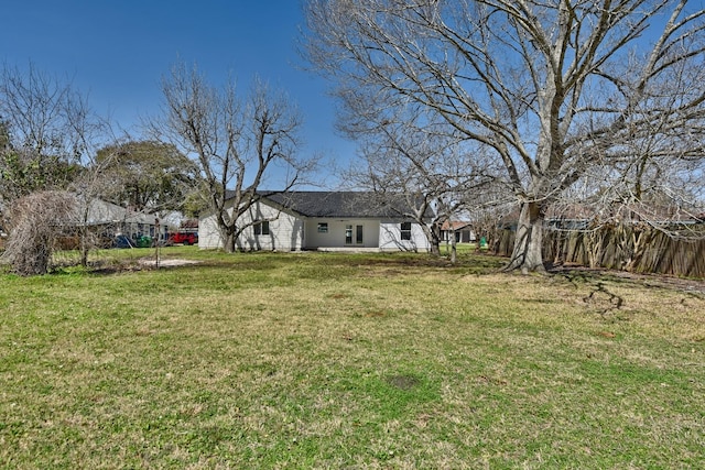 view of yard featuring fence