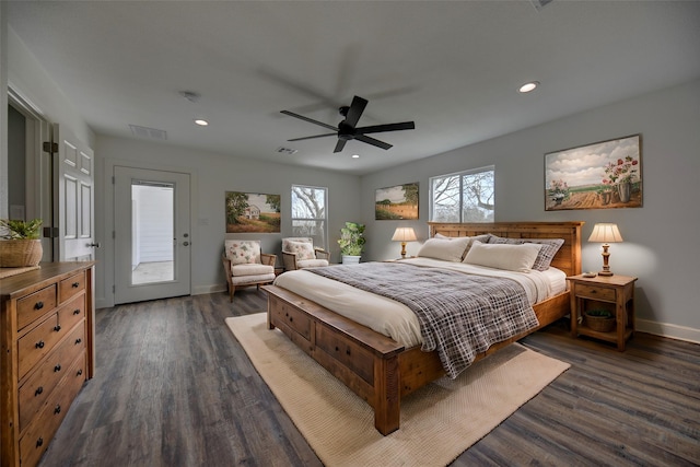 bedroom with dark wood-style floors, baseboards, visible vents, and recessed lighting