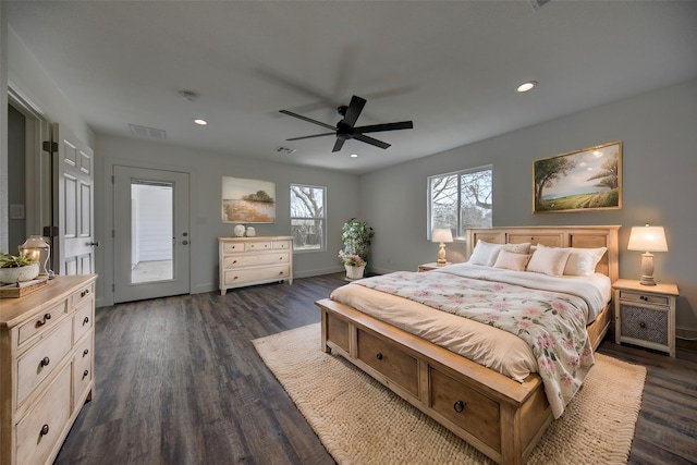 bedroom featuring dark wood-style flooring, visible vents, and recessed lighting