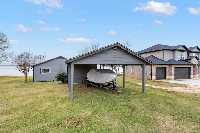 view of front of home featuring a carport, a garage, driveway, and a front lawn