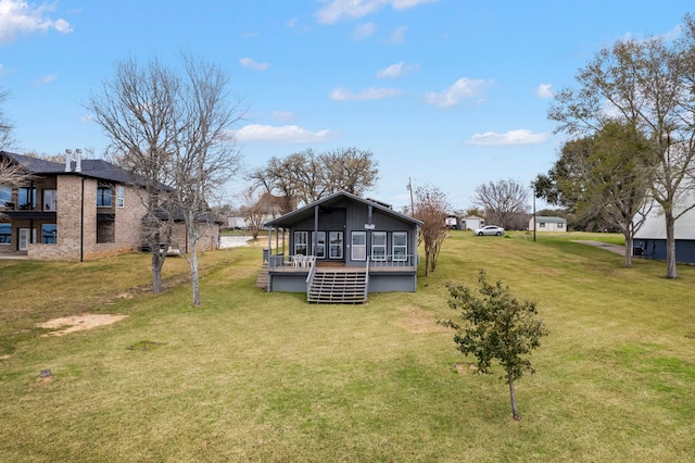 view of yard with a deck