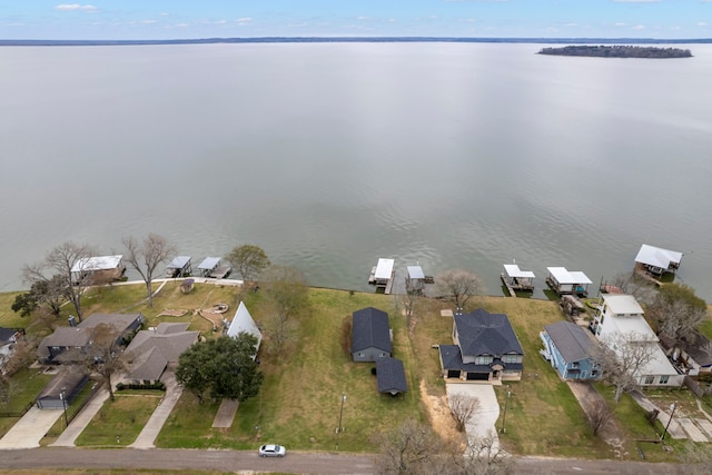 aerial view with a residential view and a water view