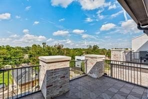 view of patio / terrace with a balcony