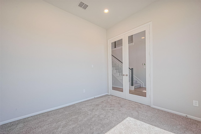 4046 Colony Ln, Missouri City, TX 77459 - carpeted spare room featuring stairway, baseboards, recessed lighting, and visible vents