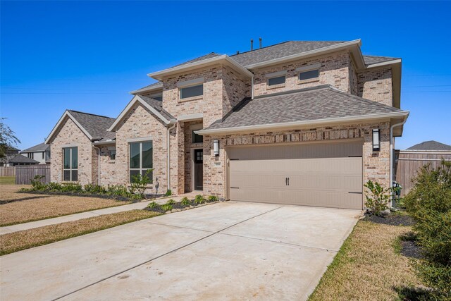 4046 Colony Ln, Missouri City, TX 77459 - view of front of house with brick siding, roof with shingles, fence, and concrete driveway