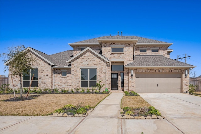 4046 Colony Ln, Missouri City, TX 77459 - view of front of home with roof with shingles, fence, an attached garage, brick siding, and concrete driveway