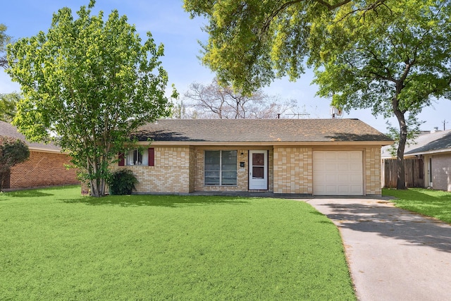 ranch-style house with concrete driveway, a front lawn, an attached garage, and fence