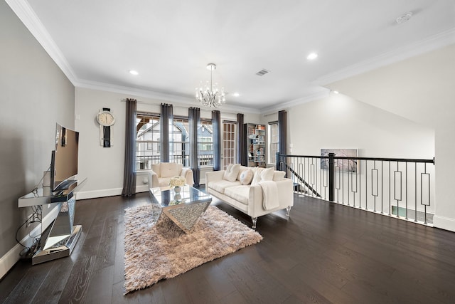 living area featuring baseboards, ornamental molding, wood finished floors, an inviting chandelier, and recessed lighting