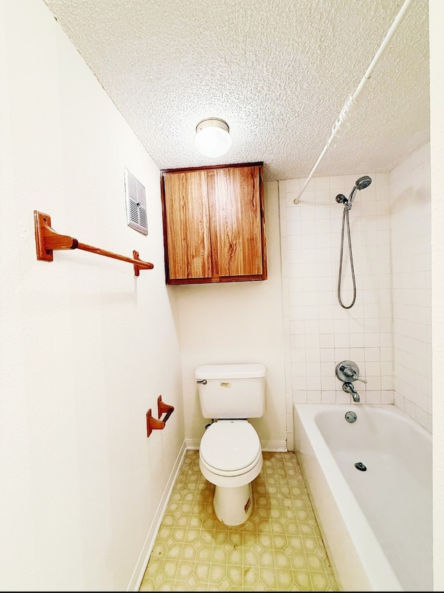 full bath with baseboards, visible vents, toilet, and tile patterned floors