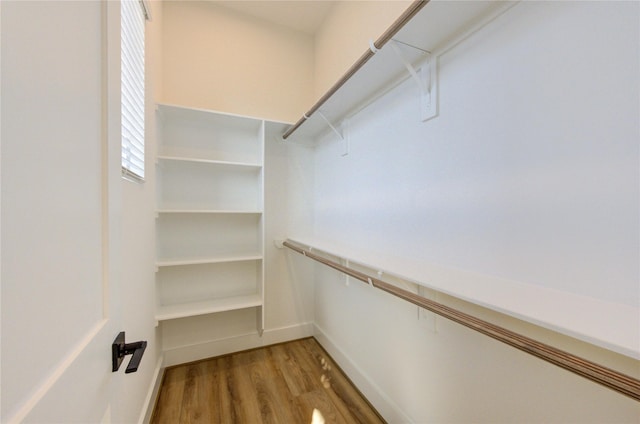 spacious closet with light wood-style floors