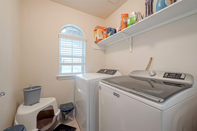 laundry room with laundry area and separate washer and dryer