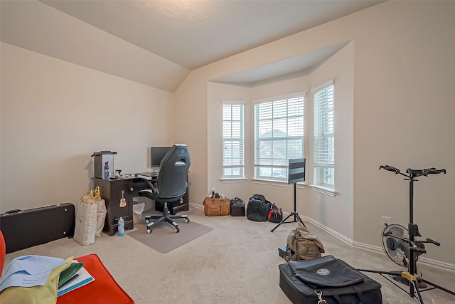 home office featuring baseboards, vaulted ceiling, and carpet flooring