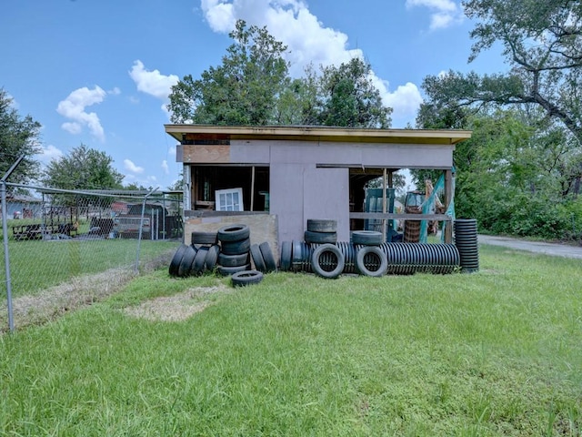 exterior space with a yard and an outdoor structure