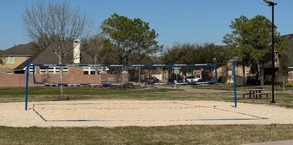 view of community featuring volleyball court