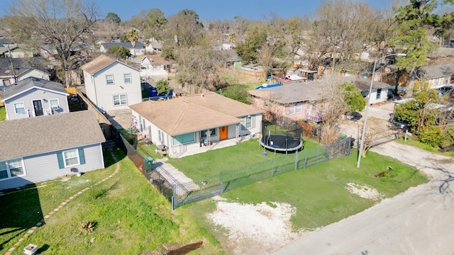 birds eye view of property with a residential view