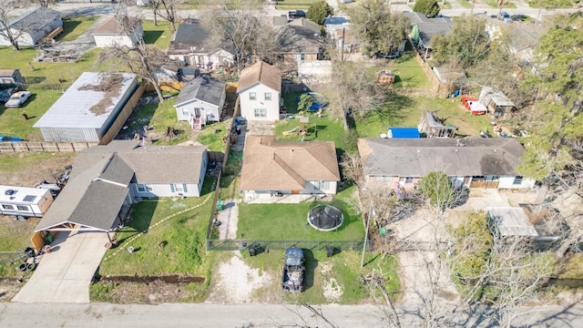 birds eye view of property with a residential view