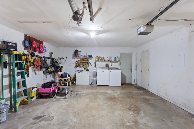 garage featuring fridge, independent washer and dryer, and a garage door opener