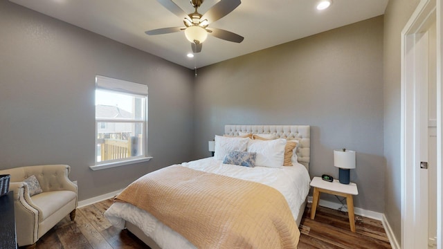 bedroom with a ceiling fan, baseboards, wood finished floors, and recessed lighting