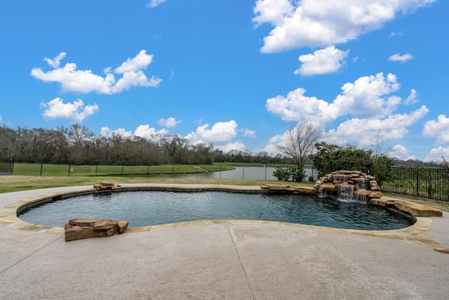 view of swimming pool featuring a lawn, a patio area, fence, and a fenced in pool