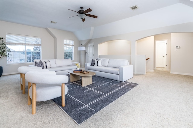 20803 Fairhaven Crossing Dr, Cypress, TX 77433 - living room with ceiling fan, carpet floors, baseboards, and arched walkways