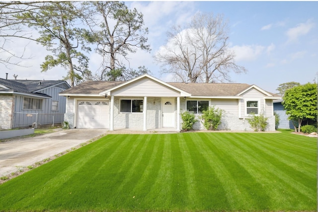 ranch-style home with a garage, concrete driveway, and a front lawn