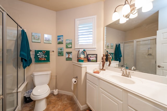 bathroom featuring tile patterned flooring, a chandelier, toilet, an enclosed shower, and vanity