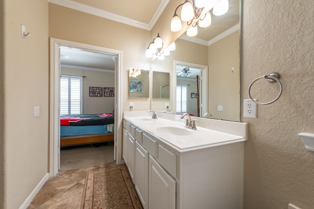 ensuite bathroom with crown molding, a healthy amount of sunlight, and a sink