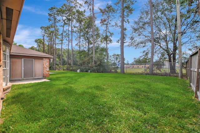 view of yard featuring a fenced backyard