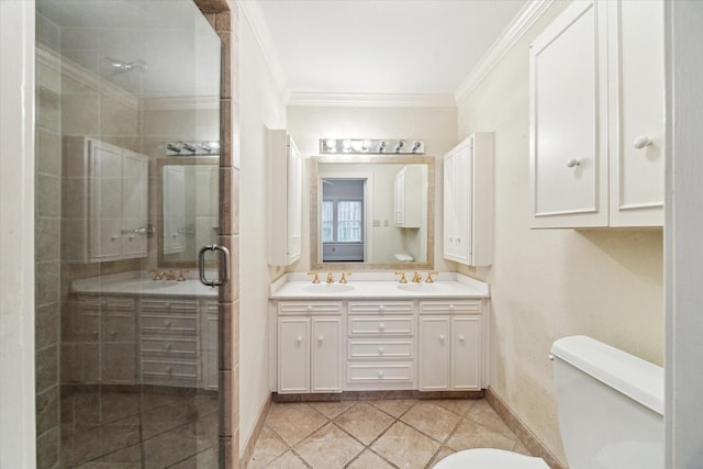 full bathroom featuring crown molding, a sink, a shower stall, and toilet