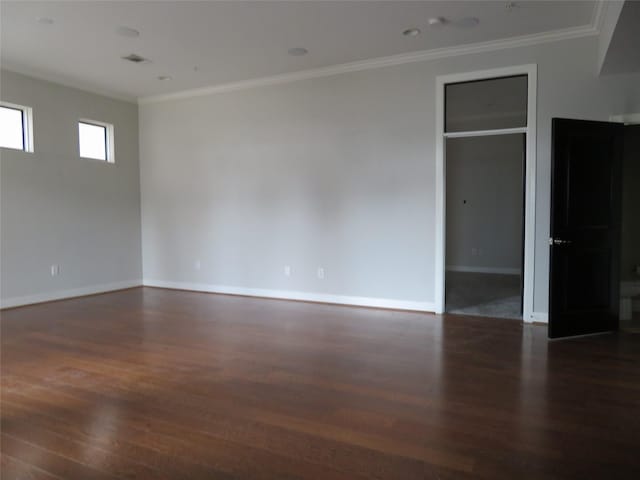 300 St Joseph Pkwy Unit 311, Houston, TX 77002 - spare room with wood finished floors, baseboards, and ornamental molding
