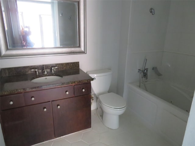 bathroom with tile patterned floors, toilet, and vanity