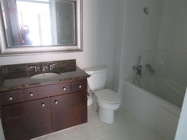 300 St Joseph Pkwy Unit 311, Houston, TX 77002 - bathroom featuring vanity, tile patterned flooring, and toilet