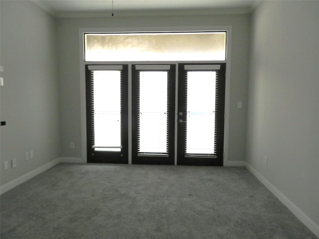 300 St Joseph Pkwy Unit 311, Houston, TX 77002 - unfurnished room with carpet floors, crown molding, and plenty of natural light