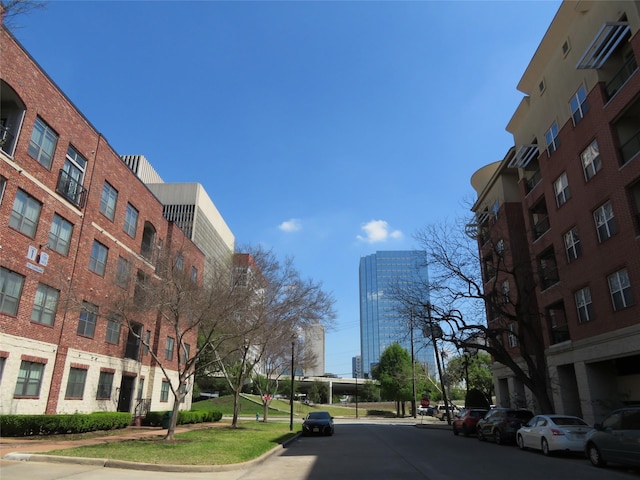 300 St Joseph Pkwy Unit 311, Houston, TX 77002 - view of street with sidewalks, curbs, and traffic signs