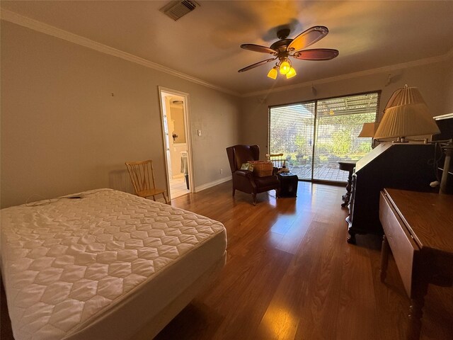 bedroom featuring access to exterior, visible vents, ornamental molding, wood finished floors, and baseboards