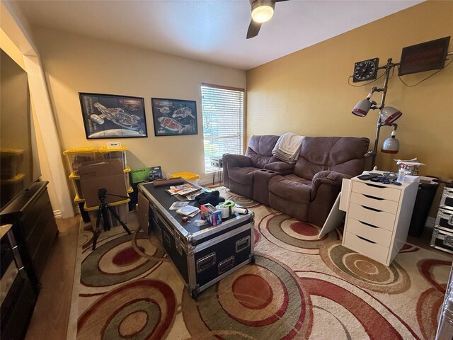 living room with a ceiling fan