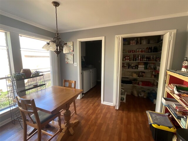 dining area with plenty of natural light, washing machine and dryer, ornamental molding, and wood finished floors