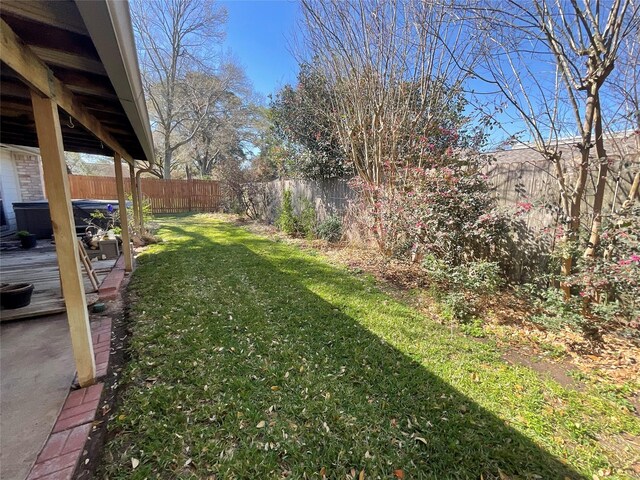 view of yard featuring a fenced backyard