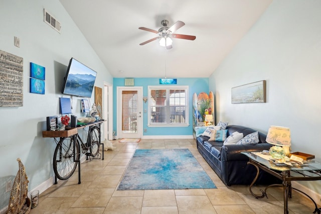 tiled living room with a ceiling fan, visible vents, high vaulted ceiling, and baseboards