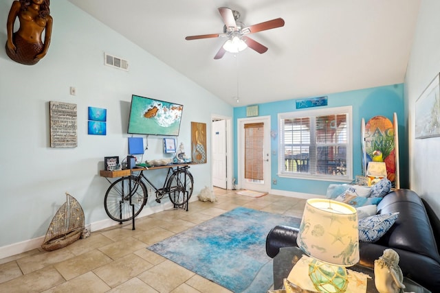 tiled living area with lofted ceiling, ceiling fan, visible vents, and baseboards