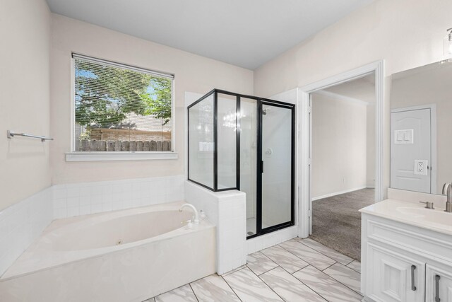 6923 Queensclub Dr, Houston, TX 77069 - bathroom with a bath, a shower stall, and vanity