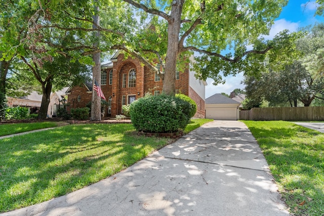 6923 Queensclub Dr, Houston, TX 77069 - traditional home with brick siding, a garage, and concrete driveway