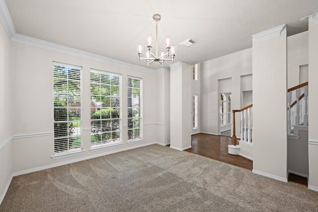 6923 Queensclub Dr, Houston, TX 77069 - carpeted empty room featuring a chandelier, stairway, and crown molding