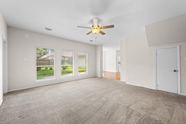6923 Queensclub Dr, Houston, TX 77069 - carpeted spare room with ceiling fan and baseboards
