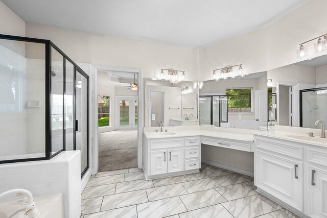 6923 Queensclub Dr, Houston, TX 77069 - full bath featuring double vanity, a shower stall, marble finish flooring, and a bath