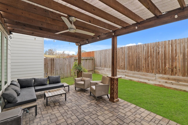 view of patio with a fenced backyard, an outdoor living space, and a ceiling fan