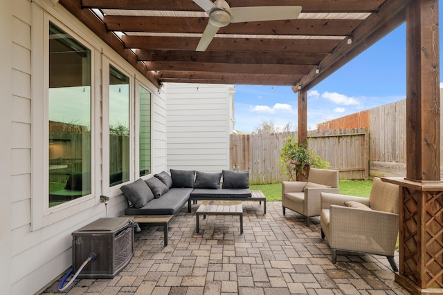 view of patio / terrace with a fenced backyard and an outdoor living space