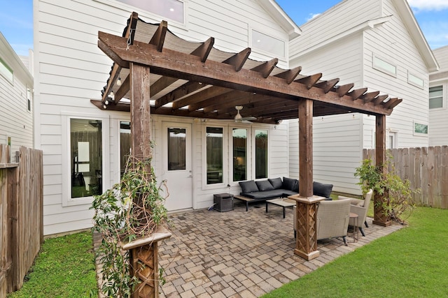 back of property featuring fence, a yard, a patio area, outdoor lounge area, and a pergola